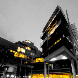 Low angle view of illuminated building against clear sky
