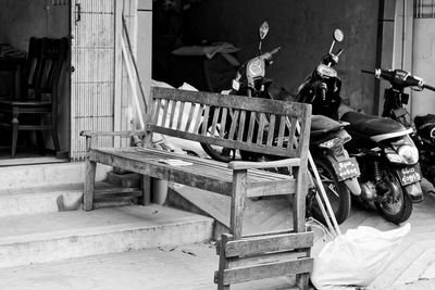 People sitting on bench in city