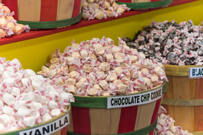 Vanilla and chocolate candies for sale in store