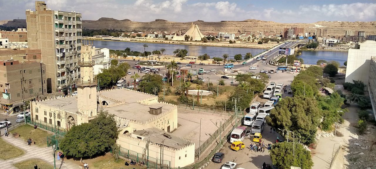 HIGH ANGLE VIEW OF TOWNSCAPE BY STREET IN CITY