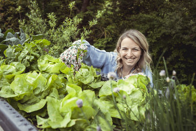 Portrait of smiling man with vegetables