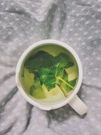 High angle view of tea in cup on table