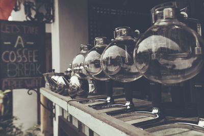 Close-up of empty bottles on table