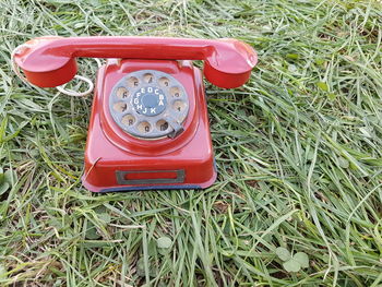 High angle view of telephone booth on field