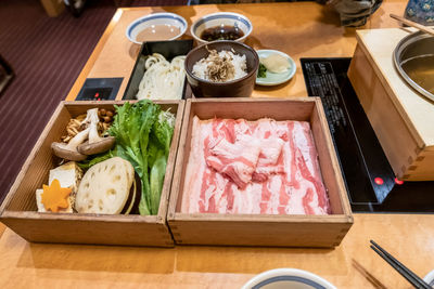 High angle view of chopped vegetables on table