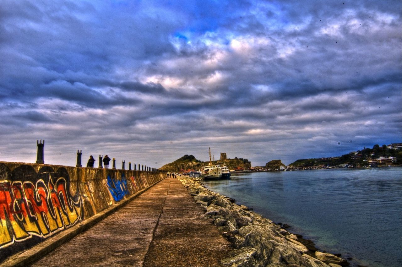 sky, cloud - sky, water, sea, cloudy, cloud, the way forward, pier, scenics, beach, nature, tranquility, beauty in nature, horizon over water, tranquil scene, built structure, transportation, weather, outdoors, shore