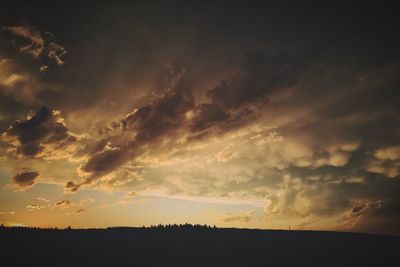 Scenic view of silhouette landscape against sky during sunset