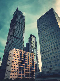 Low angle view of modern buildings against sky