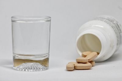 Close-up of drink against white background