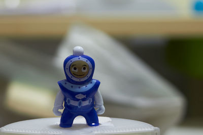 Close-up of figurine on table