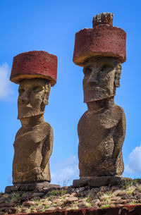 Low angle view of statue against sky