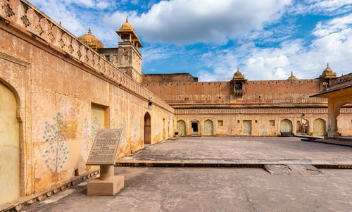 View of historic building against cloudy sky