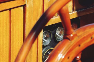 Close-up of orange motorcycle