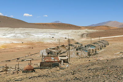 Scenic view of landscape and mountains against sky