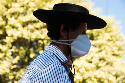 Side portrait of south american man during quarantine