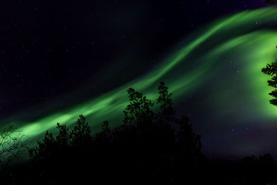 Aurora borealis and stars on nightsky. 