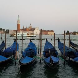 Boats moored in sea