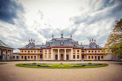 Building against cloudy sky