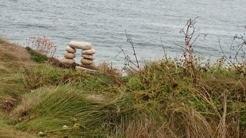 High angle view of stack on shore