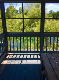 View of trees seen through window