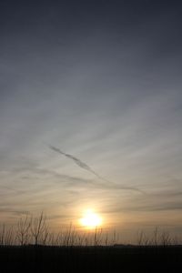 Scenic view of landscape against sky during sunset