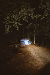 View of tent on field at night