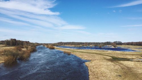 Scenic view of river against sky