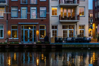 Reflection of building in city at night