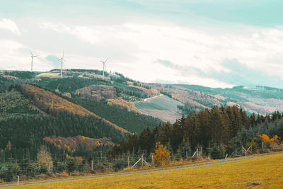 Sauerland hochsauerlandkreis nrw germany landscape with mountains, hills, wind tribunes and grass