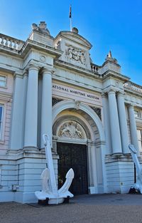 Low section of statue of historic building