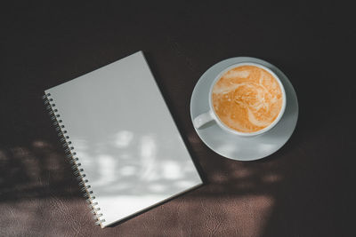 High angle view of coffee on table