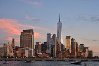 Modern buildings in a pink sky