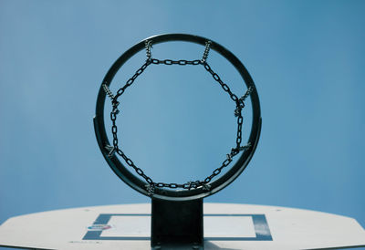 Low angle view of basketball hoop against sky