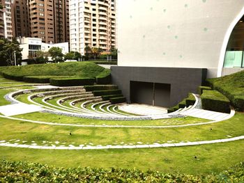 View of garden with buildings in background