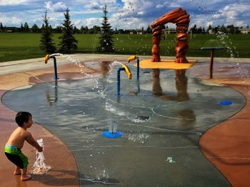 Silhouette of woman in water