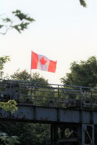 Low angle view of flag against sky