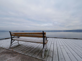 Pier over sea against sky