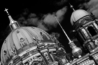 Tilt image of berlin cathedral and fernsehturm tower against sky in city