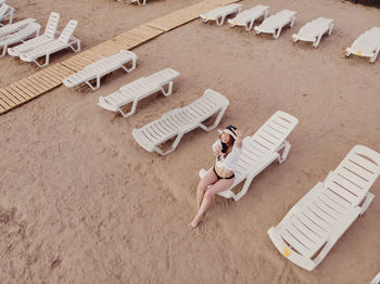 Aerial view of a girl on the beach. vacation and adventure