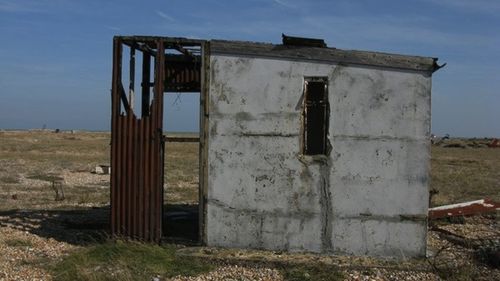 Old wooden fence on field