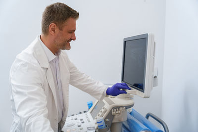 Young man working at clinic