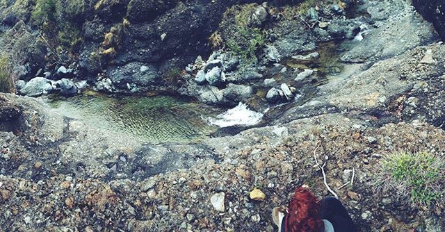 water, low section, person, high angle view, lifestyles, personal perspective, leisure activity, standing, rock - object, human foot, men, nature, unrecognizable person, stone - object, shoe, day