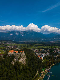 High angle view of townscape against cloudy sky