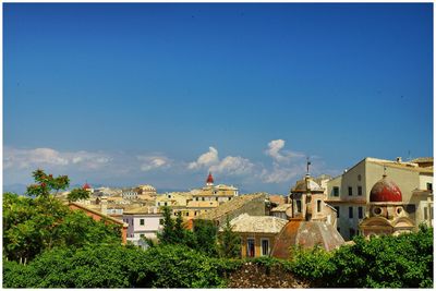 Town against blue sky