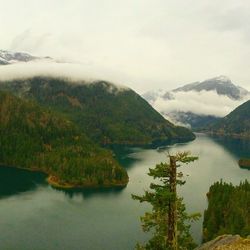 Scenic view of lake with mountains in background