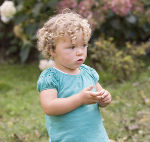 Cute boy looking away outdoors