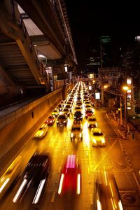 Traffic on road in city at night