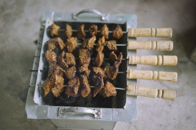 Close-up of meat on barbecue grill