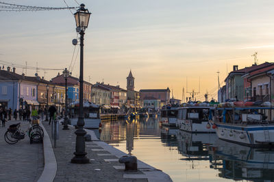 View of harbor at sunset