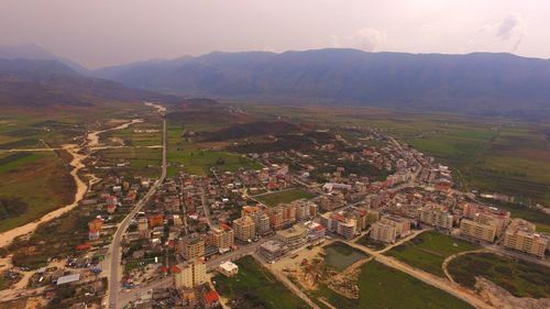 High angle view of townscape against sky in city